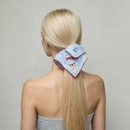 Sky-blue scarf tie with embroidered bunnies and wildflowers by Tide Tie
