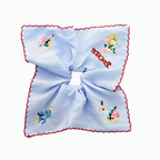 Sky-blue scarf tie with embroidered bunnies and wildflowers by Tide Tie